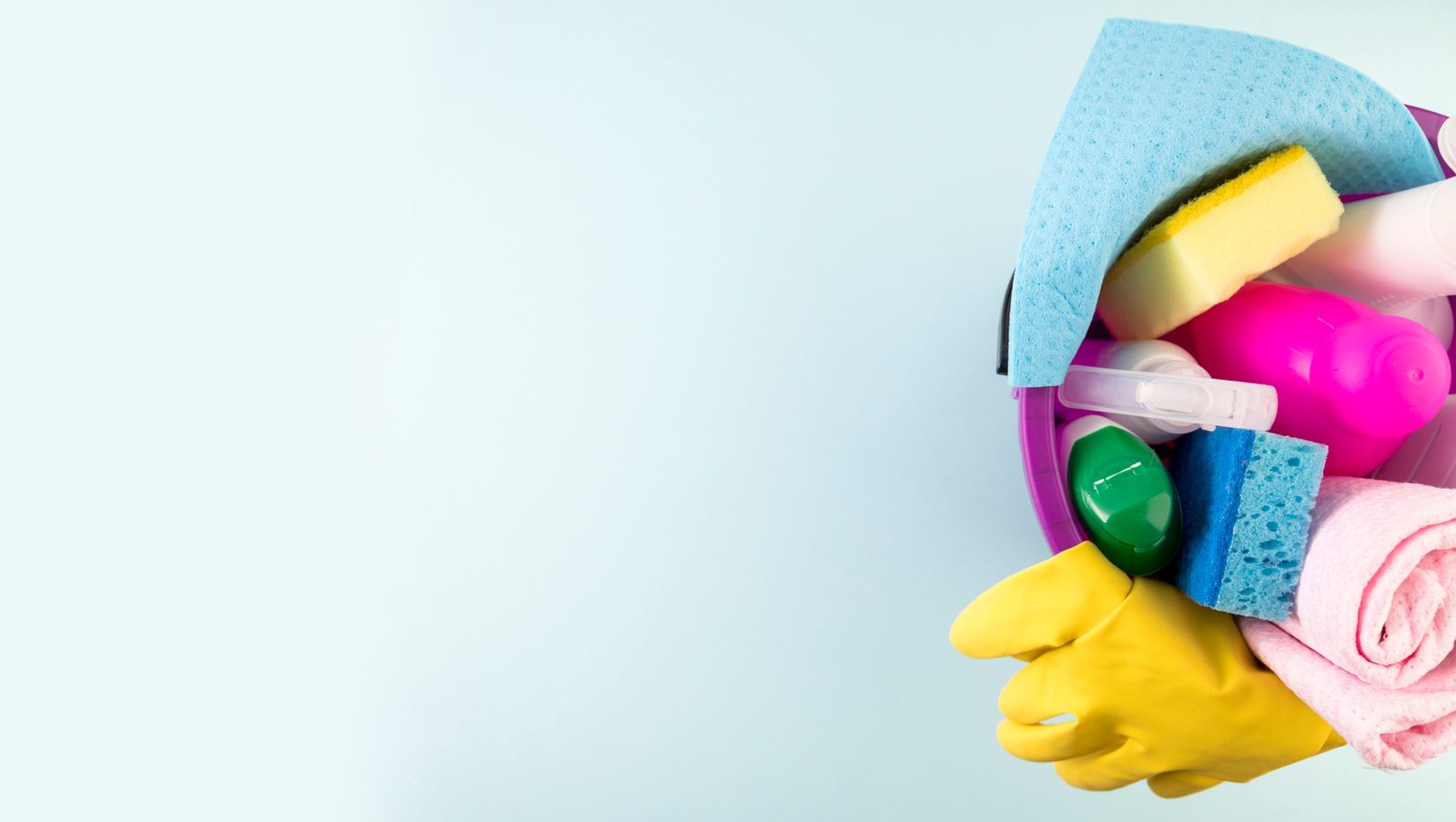 Home cleaning specialist with eco-friendly supply kit